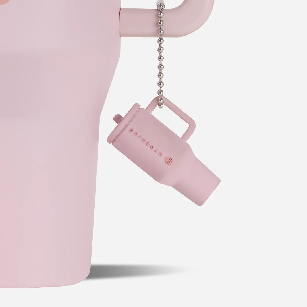 traveler-keychain-x6 Web-TravelerKeychainPhotos-PinkSand2.webp